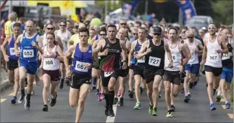  ??  ?? Athletes at the start of the Ransboro 10k on Saturday evening which raised money for the Elaine O’Halloran Fund.