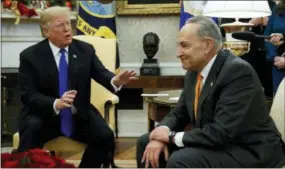  ?? EVAN VUCCI — THE ASSOCIATED PRESS ?? President Donald Trump speaks to Senate Minority Leader Chuck Schumer, D-N.Y., during a meeting with Democratic leadership in the Oval Office of the White House, Tuesday, in Washington.