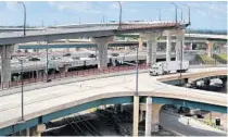  ?? JOE BURBANK/ORLANDO SENTINEL ?? Florida waited until this week — when more workplaces were re-opened — to shut down big chunks of Interstate 4, pictured here on March 25.