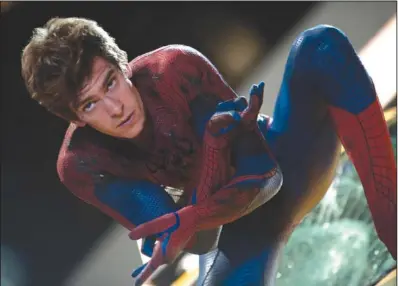  ??  ?? ON THE WEB: In this film image released by Sony Pictures, Andrew Garfield is shown in a scene from “The Amazing Spider- Man, set for release on July 3.