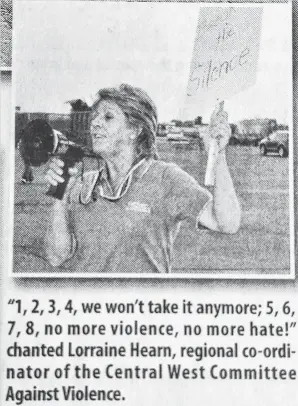  ?? CONTRIBUTE­D ?? Take Back the Night coverage from the Sept. 19, 2011 edition of the Advertiser shows Lorraine Hearn in her element, chanting “1, 2, 3, 4 we won’t take it anymore; 5, 6, 7, 8, no more violence, no more hate.”