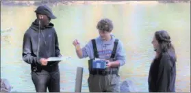  ?? SUBMITTED PHOTO ?? Hill School students, assisted by experts from the Stroud Water Research Center, test the quality of the water in the Schuylkill River at Towpath Park in East Coventry.