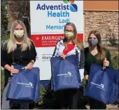  ?? COURTESY PHOTOS BY LAUREN NELSON ?? Adventist Health Lodi memorial stroke coordinato­r Heather Tate, Jennie and Larissa Johnston delivered goodie bags to LOEL Center, Adult Day Care, Arbor Senior Living and Solstice this week for Brain Awareness Week.