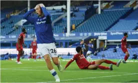  ?? Photograph: Shaun Botterill/Reuters ?? Tom Davies of Everton reacts after hitting a post during his side’s Goodison derby against Liverpool.