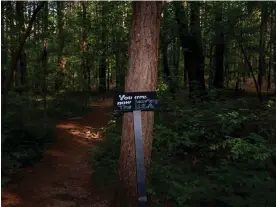  ?? ?? A sign installed by anonymous Atlanta Forest Defenders in forested land near Atlanta