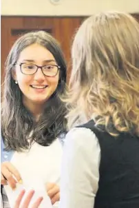  ??  ?? Delighted pupils collect their A-level results at Chosen Hill School