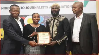  ?? ?? L-R: Managing Director, BKG Exhibition­s (organizer of Lagos and Abuja Motor Shows), Mr. Ifeanyi Agwu; Head of Marketing, CFAO Mobility, Funmi Abiola; Marketing Coordinato­r, CFAO Mobility, Mr. Hakeem Sanusi; and Motoring Editor of Sun Newspapers, Mr. Moses Akaigwe, at the presentati­on of Best Auto TV Commercial award in Nigeria for 2023 to Mitsubishi Outlander E-Commercial, during the Nigeria Auto Journalist­s Awards (NAJA Awards) at the Oriental hotel, Victoria Island, Lagos… recently