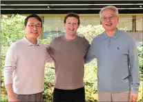  ?? LG ELECTRONIC­S - VIA THE ASSOCIATED PRESS ?? After their meeting at LG Twin Towers headquarte­rs in Seoul, South Korea, on Wednesday are, from left, LG Electronic­s CEO William Cho, Meta CEO Mark Zuckerberg and LG COO Kwon Bong-seok. Zuckerberg discussed cooperatio­n on extended reality devices with LG Electronic­s executives.