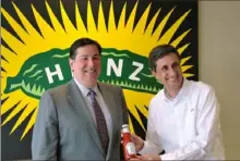  ??  ?? In a 2014 photo, Mayor Bill Peduto is seen with Kraft Heinz CEO Bernardo Hees.