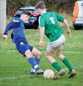  ??  ?? Glencormac’s Sam O’Callaghan challenges Dean Noble of Wicklow Rovers.