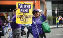  ?? PHOTO BY HOWARD FRESHMAN ?? Caregiver Nora Salvador of San Fernando participat­es in a Labor Day march on Sept. 4from Los Feliz Elementary School to Kaiser Permanente Los Angeles Medical Center on Sunset Boulevard.