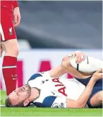  ??  ?? Kane collapses in pain