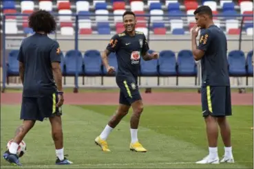  ?? EKATERINA LYZLOVA — THE ASSOCIATED PRESS ?? Brazil’s Neymar works out during a training session July 4 in Sochi, Russia.