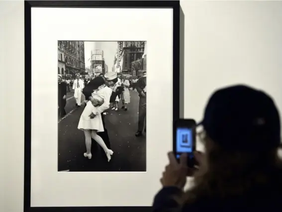  ??  ?? Caught in a kiss: joy at the end of the Second World War (AFP)