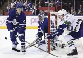  ?? CP PHOTO ?? Jake Gardiner (51) has slid out from under the harsh glare of Toronto’s hockey spotlight.