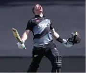  ??  ?? New Zealand’s Glenn Phillips celebrates on reaching his century