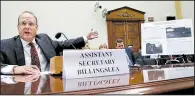  ?? AP/JACQUELYN MARTIN ?? Marshall Billingsle­a, assistant secretary for terrorist financing at the Treasury Department, displays satellite images Tuesday at a House Foreign Affairs Committee hearing, saying they show deceptive shipping practices by North Korea, primarily in...