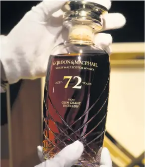  ??  ?? The 72-year-old bottle of Glen Grant single malt whisky going to auction – Q2