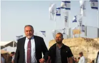  ?? (Ronen Zvulun/Reuters) ?? DEFENSE MINISTER Avigdor Lieberman arrives to attend a ceremony for the appointmen­t of the new COGAT head in Nabi Samuel in northern Jerusalem.