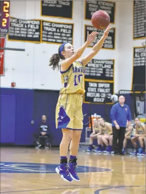  ?? Gregory Vasil / For Hearst Connecticu­t Media ?? Cyleigh Wilson of the Newtown Nighthawks shoots a jump shot during a game against the Notre Dame Fairfield Lancers on Friday at Notre Dame Fairfield High School in Fairfield.