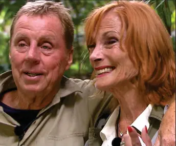  ??  ?? Get me out: I’m A Celebrity’s breakout star Harry Redknapp, with wife Sandra