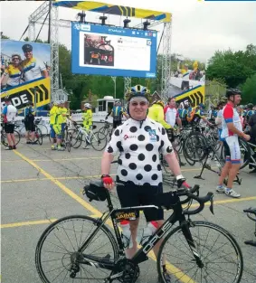  ??  ?? below Dr. Jaime Escallon at the Ontario Ride to Conquer Cancer in 2015