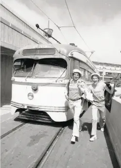  ?? Clem Albers / The Chronicle 1980 ?? Andrew Coblentz (left) and Larry Baer created the 1980 Total Muni Experience, riding 71 bus, streetcar and cable car lines in one day.