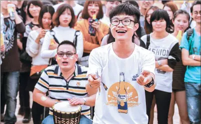  ?? PROVIDED TO CHINA DAILY ?? A young man dances to African drum beats at the Corona Sunsets Music Festival held in Guangzhou, Guangdong province recently.