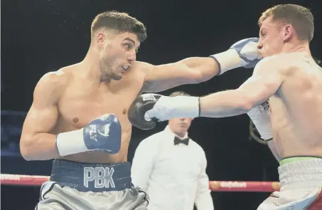  ??  ?? Sunderland boxer Josh Kelly, left, in action against Jay Byrne.