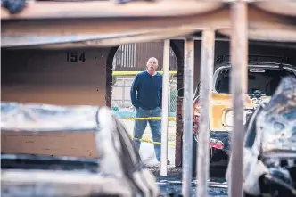  ?? ROBERTO E. ROSALES/JOURNAL ?? At least 58 cars were damaged in a fire outside the Villa Apartments on Cardenas SE on Friday morning.