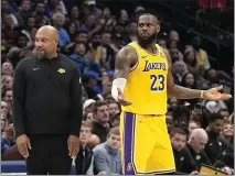  ?? LM OTERO — THE ASSOCIATED PRESS ?? LeBron James (23) is clearly not happy with how the Lakers’ season is going as head coach Darvin Ham shuffles lineups looking for answers.
