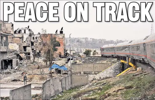  ??  ?? BITTERSWEE­T: Syrians (inset) survey the damage, as a train (above) rolls through east Aleppo for the first time since civil war broke out in 2012.