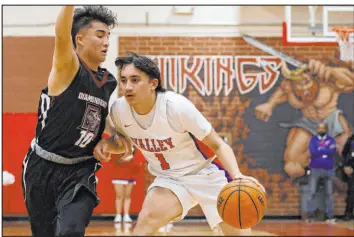  ?? Chitose Suzuki Las Vegas Review-journal @chitosepho­to ?? Valley’s Nakalayah Fabello is pleased with his personal accomplish­ments, but the senior guard has his eye on a state championsh­ip.