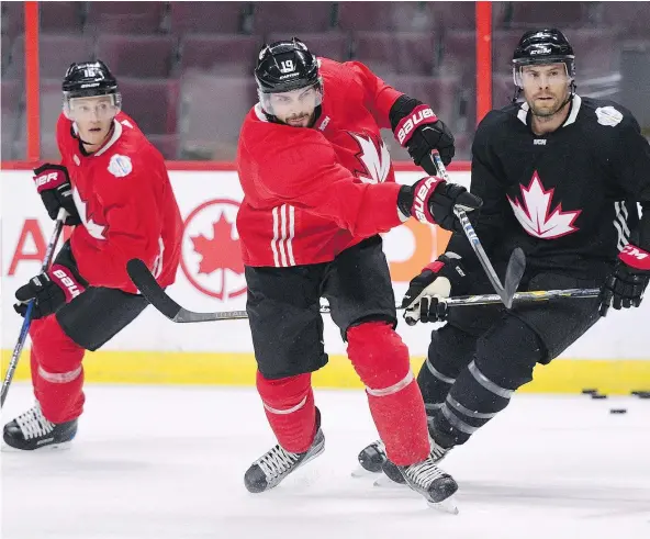  ?? — THE CANADIAN PRESS FILES ?? Team Canada’s Tyler Seguin, centre, is out of the World Cup of Hockey after admitting to team staff he may not have been truthful about the severity of a lingering Achilles ailment. He’s not the first player to downplay an injury in order to make a team.