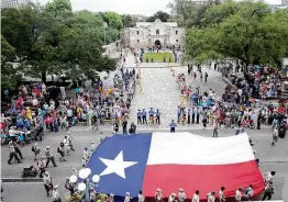  ?? Tom Reel / Staff photograph­er ?? The advisory panel’s new plan will maintain access to Alamo Street for Fiesta parades. In addition, the city will set up a human remains protocol and archival investigat­ion to soothe discord with the Tap Pilam Coahuiltec­an Nation over burial sites.