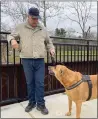  ?? MEDIANEWS GROUP ?? Spring City resident Greg Howland and his dog Kona chose the completed trestle bridge as the place for their walk Wednesday.