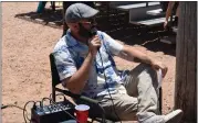  ?? SARA WAITE — JOURNAL-ADVOCATE ?? Chris “Bull” Brom provides color commentary for the fans at the Colorado Vintage Base Ball Associatio­n game, part of the Overland Trail Museum’s 2022Herita­ge Festival.