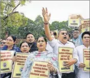  ?? HT FILE ?? TMC Party leaders shout slogans against Modi government while protesting against NRC in Parliament.