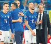  ?? AP ?? Cristiano Biraghi (2nd right) with Italy coach Roberto Mancini.
