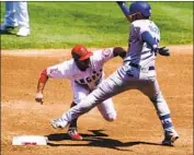  ?? Marcio Jose Sanchez Associated Press ?? ANGELS SHORTSTOP David Fletcher tags out the Dodgers’ Matt Beaty at second base in August 2020.