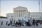  ?? AFP ?? ■ Journalist­s set up in front of the Supreme Court building ahead of US President Trump’s announceme­nt of his judge nomination.