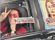  ?? Genaro Molina Los Angeles Times ?? LORRAINE QUIÑONES, a fourth-grade teacher at Multnomah Elementary in L.A., joins in a car caravan protest against a rapid reopening of campuses.