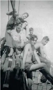  ??  ?? FAR LEFT The ship’s articles promised Bob “a liberal scale of rations”. MIDDLE LEFT Sixteen-year-old Bob Howard after joining the ship. He didn’t take long to learn the ropes. LEFT The ship’s boys enjoy time out on the bowsprit in the Atlantic doldrums.