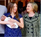  ??  ?? ABOVE: First Lady Hillary listens to a speech on women’s equal pay in June 1998. LEFT: With Chelsea and baby Aidan, her second grandchild, in June 2016.