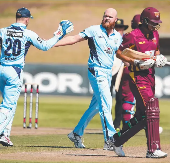  ?? Picture: GETTY IMAGES ?? Blues paceman Doug Bollinger celebrates taking the wicket of Charlie Hemphrey in the four-wicket win against the Bulls in Sydney yesterday.