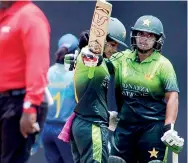  ??  ?? Javeria Khan celebrates her century (PIC courtesy SLC)