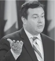  ?? ADRIAN WYLD/THE CANADIAN PRESS ?? Immigratio­n Minister Jason Kenney was forced to backtrack on the temporary foreign worker program Tuesday.