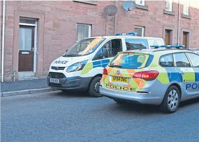 ??  ?? Police activity at a house on St Vigeans Road in Arbroath where a baby girl was found with “unexplaine­d injuries” last weekend and is now in hospital in Edinburgh fighting for her life.