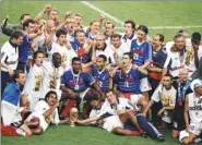  ?? AFP ?? French players celebrate winning the 1998 World Cup.