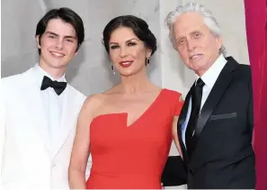  ?? Picture: Robert Melen ?? Catherine Zeta-jones with husband Michael Douglas and their son Dylan arriving for a gala dinner at Swansea’s Guildhall to celebrate her freedom of the city, which she received in 2019.